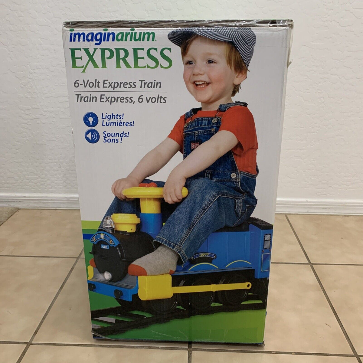 Imaginarium deals Express 6 Volt Ride On Train W/ Track Battery Lights Sounds